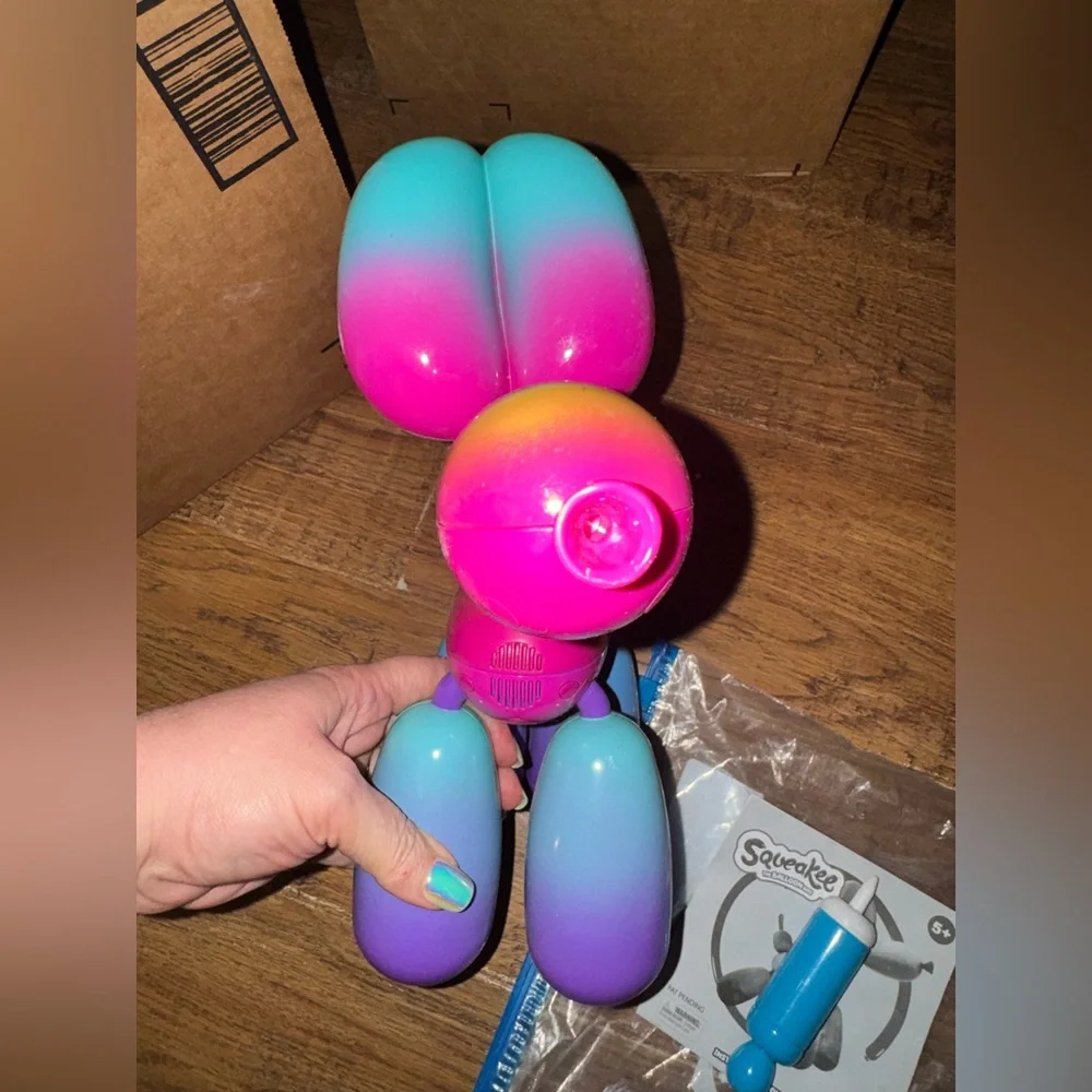 Squeakies interactive balloon animal rainbow dog
